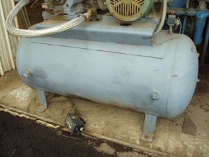 A typical air tank suffering from being outside in a cement plant all the time.
